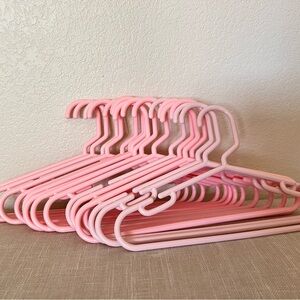 Kids pink plastic hangers, 17 count